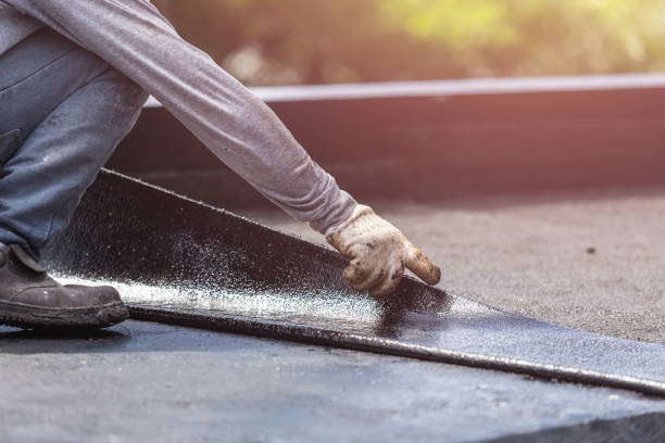 Professional Basement Waterproofing technician working in Huntersville, NC